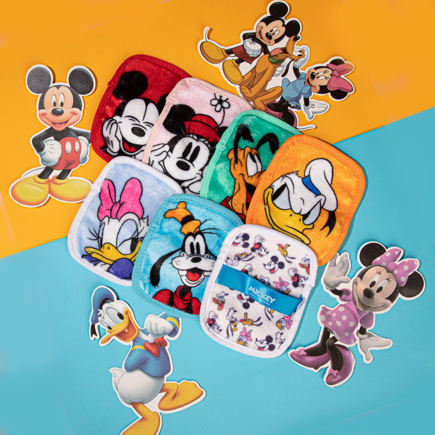 Mickey & Friends 7-Day Set MakeUp Eraser cloths next to mickey amd friends images.